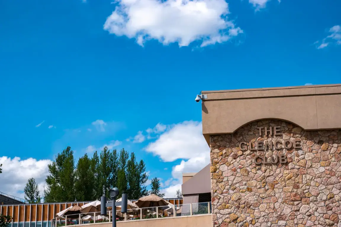 The Glencoe Club exterior and sign near Elbow Park